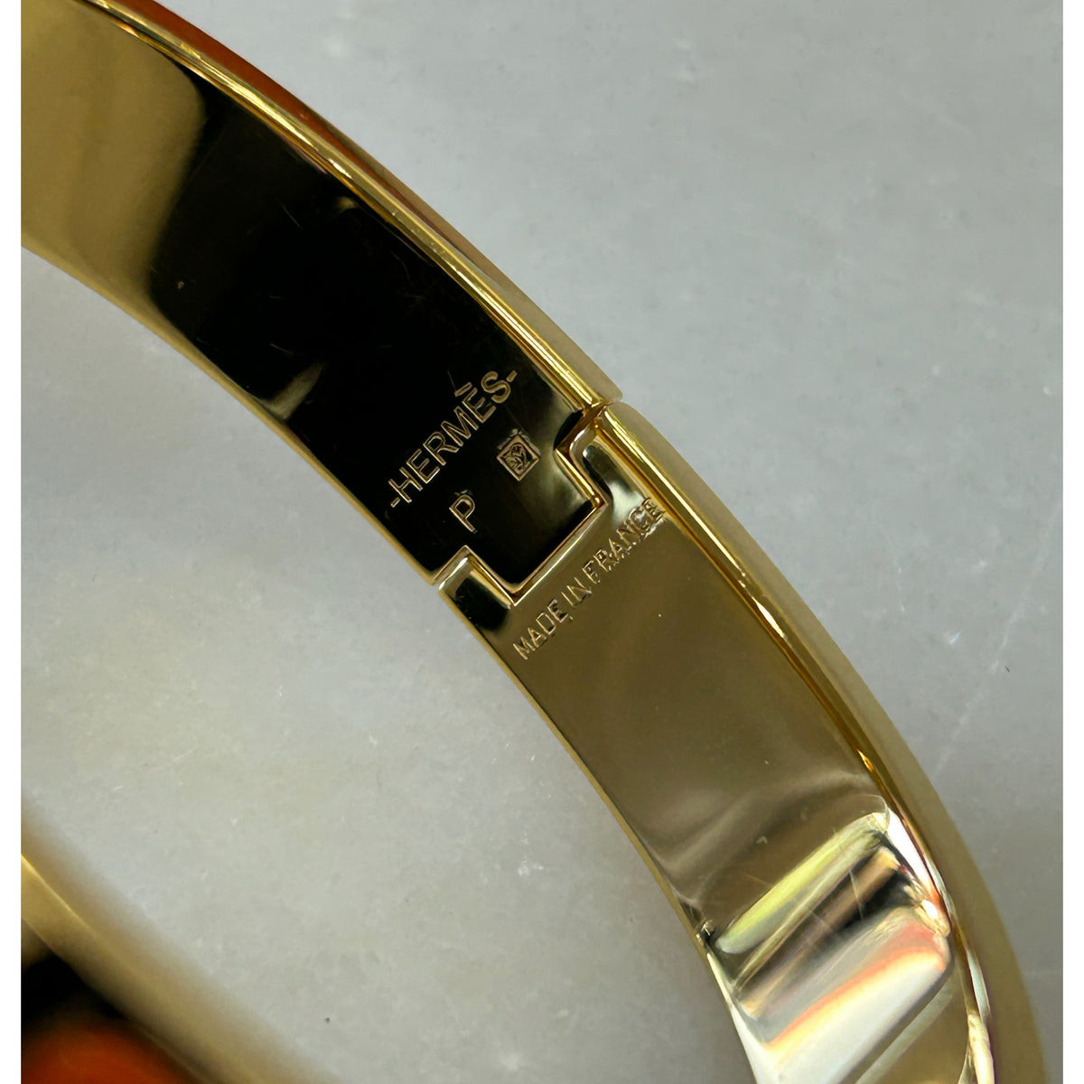 HERMÈS - Clic H Bracelet Orange & Gold GM