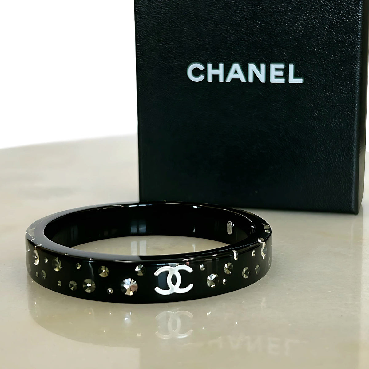 CHANEL - Black Resin Crystal CC Bangle