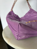 CHANEL 22 Handbag in Purple Leather - Medium