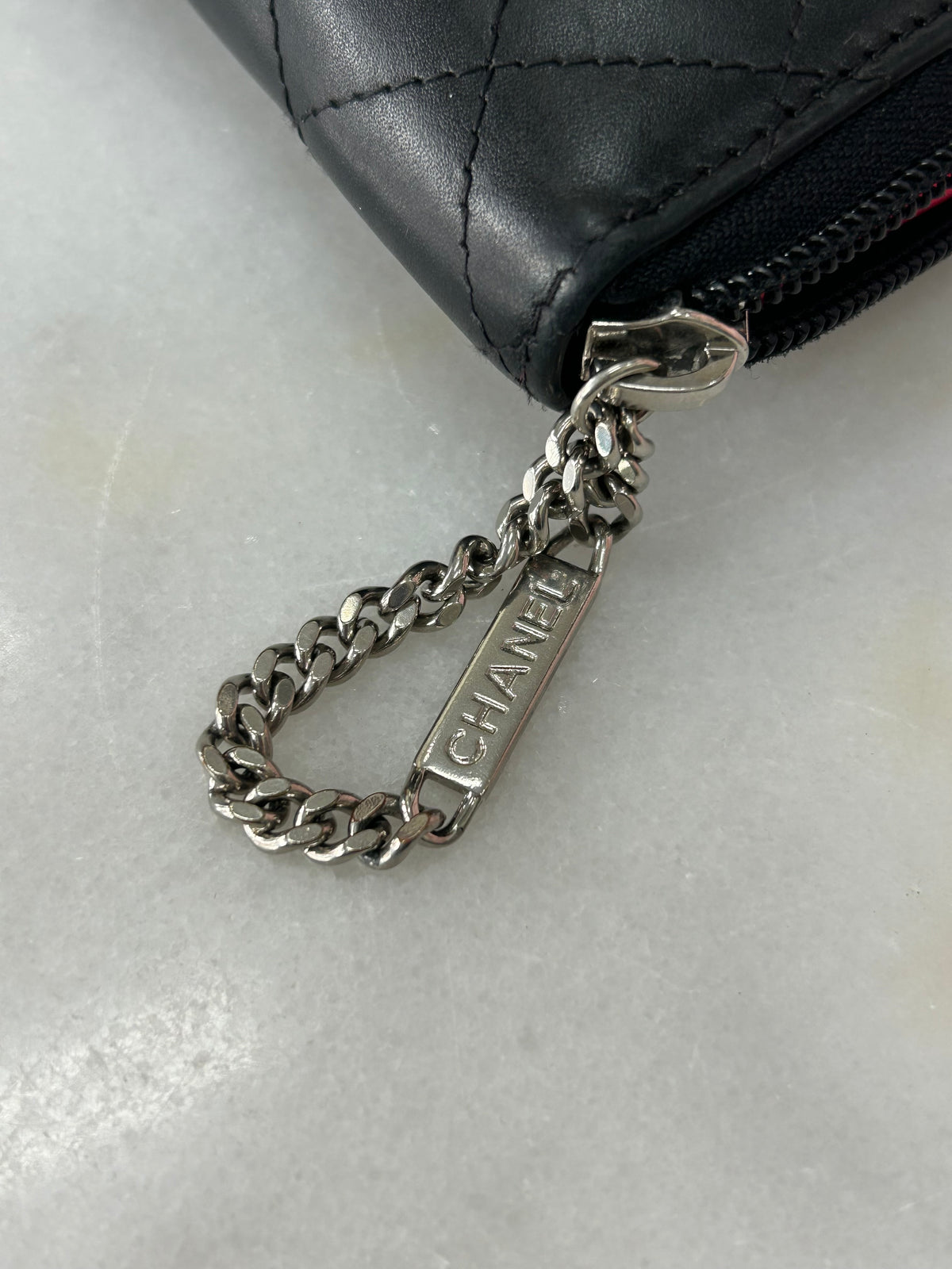 CHANEL - Black Quilted Cambon Zip-Around Wallet