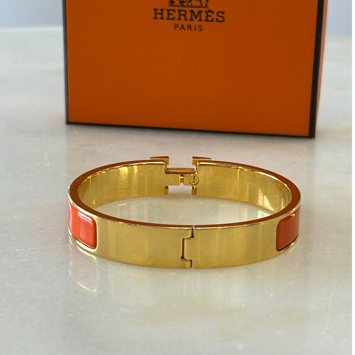 HERMÈS - Clic H Bracelet Orange & Gold GM