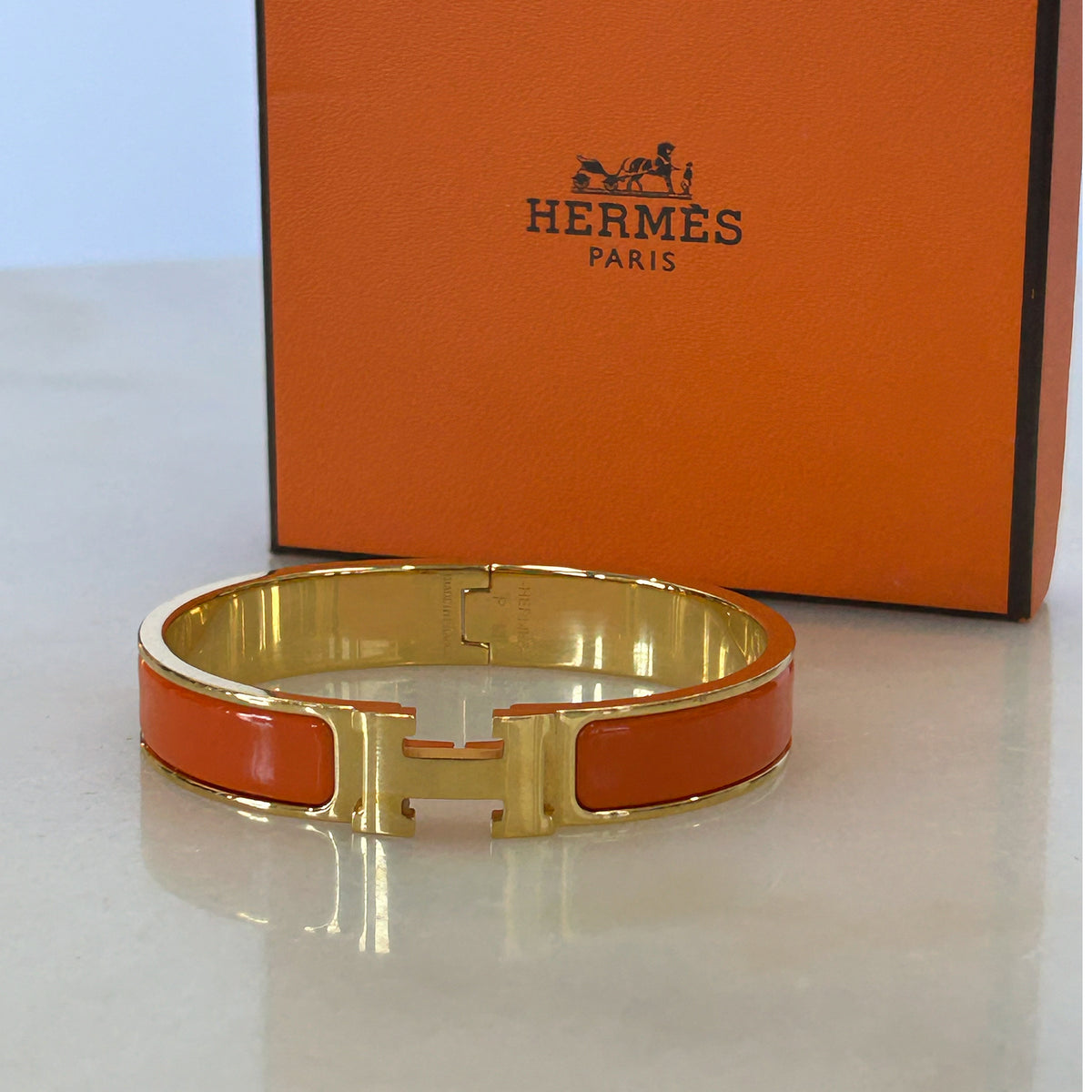 HERMÈS - Clic H Bracelet Orange & Gold GM