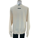 FEAR OF GOD ESSENTIALS - 
Logo 'Buttercream' Sweater Sz L