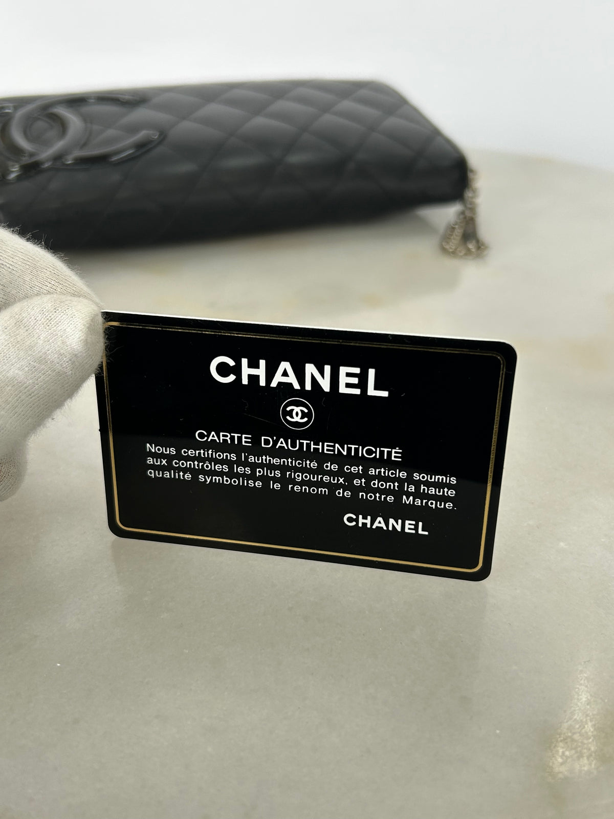 CHANEL - Black Quilted Cambon Zip-Around Wallet