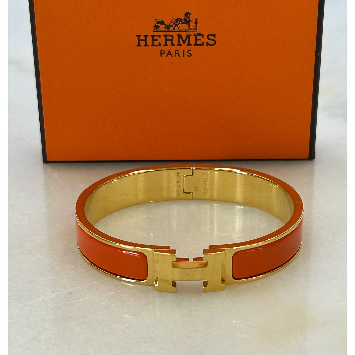 HERMÈS - Clic H Bracelet Orange & Gold GM
