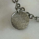 TIFFANY & Co. - Silver Notes Fifth Avenue Round Tag Bracelet